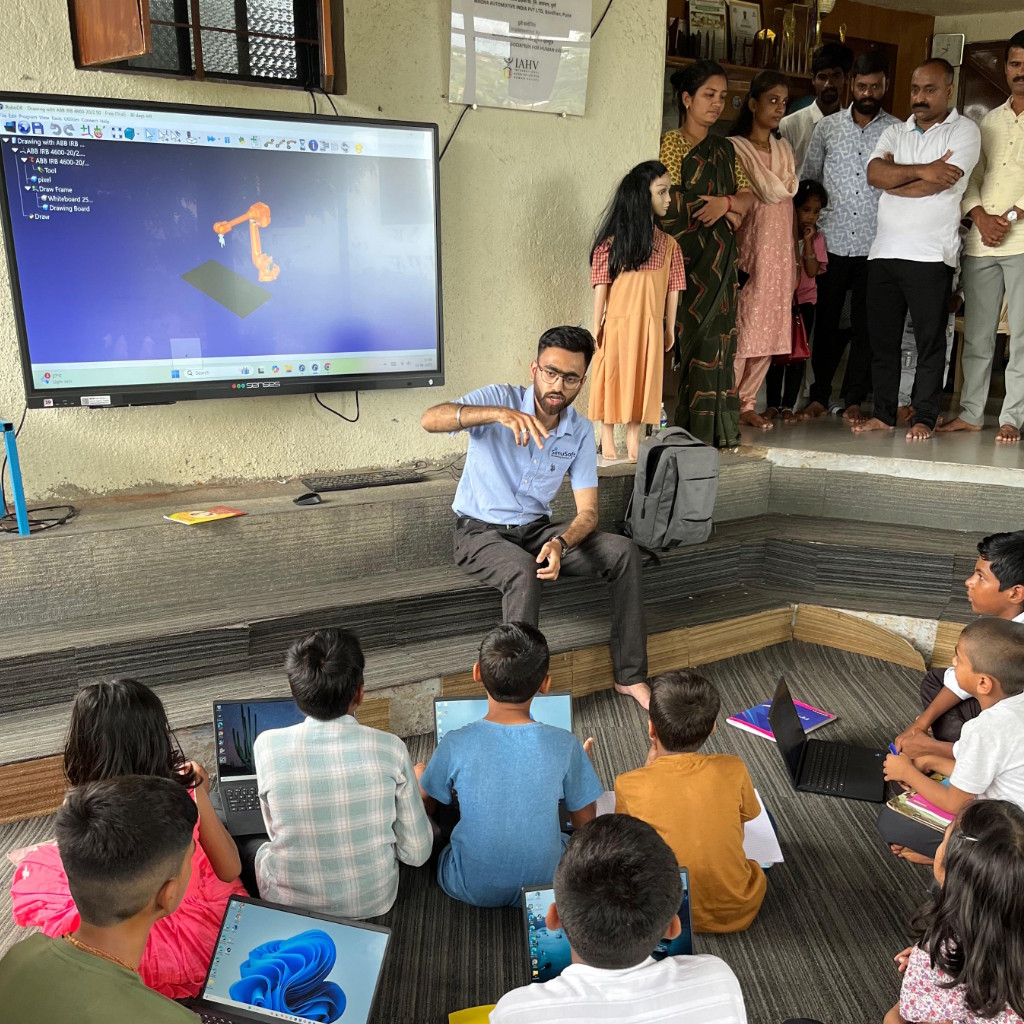 School kids learning RoboDK